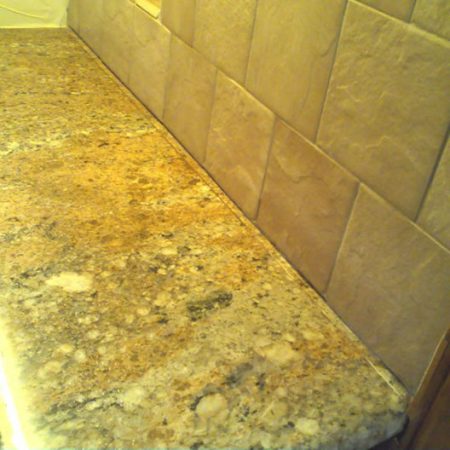 Granite Counter Seam by Wall Reparation