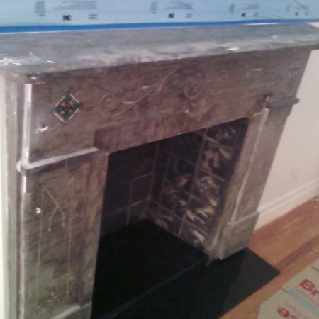 Gray Marble Fireplace in Post Construction Dirt