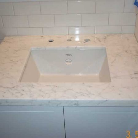 White Carrara Vanity. Sink Installed