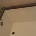 Stains and Erosion on Limestone Bathtub Top