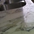 Dull Specks or Etching Burns on Kitchen Countertop